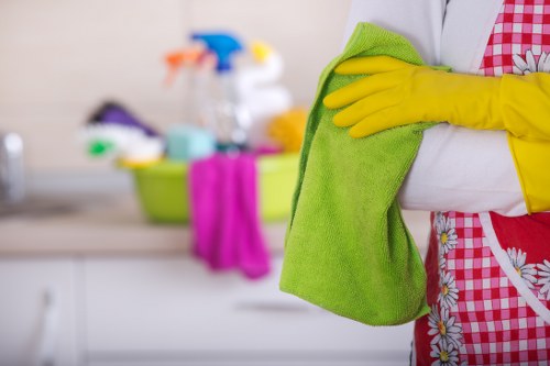 Cleaner using careful lifting and moving practices in a home